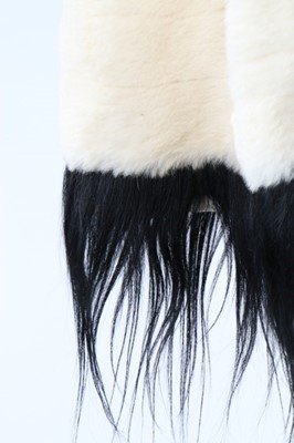 Lot 297 - An ermine cape edged in black monkey fur,...