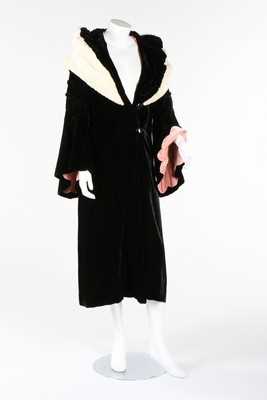 Lot 310 - A black velvet evening coat, early 1930s,