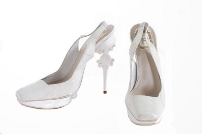 Lot 314 - A pair of John Galliano for Dior white leather...