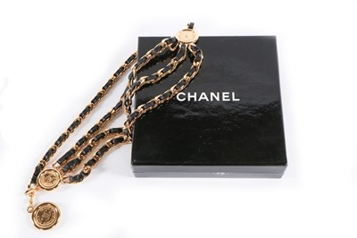 Lot 351 - A Chanel woven leather chain belt, early 1990s,...