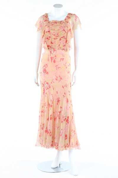 Lot 138 - A printed chiffon garden party gown, early...