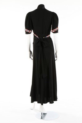 Lot 140 - A black moss crepe evening gown with sequined...