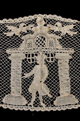 Lot 401 - A length of figurative bobbin lace, Milanese,...