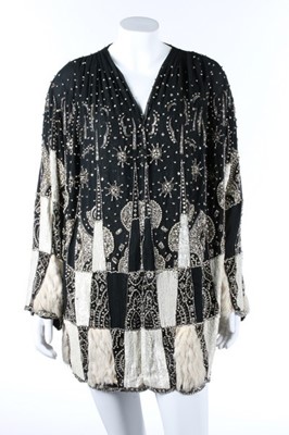 Lot 51 - A beaded and sequined couture evening jacket,...