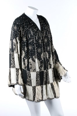 Lot 103 - A beaded and sequined couture evening jacket,...