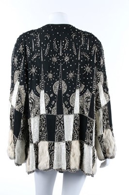 Lot 103 - A beaded and sequined couture evening jacket,...