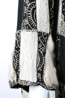 Lot 103 - A beaded and sequined couture evening jacket,...