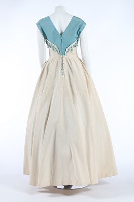 Lot 48 - A Norman Hartnell couture beaded ivory and...