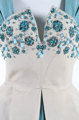 Lot 48 - A Norman Hartnell couture beaded ivory and...