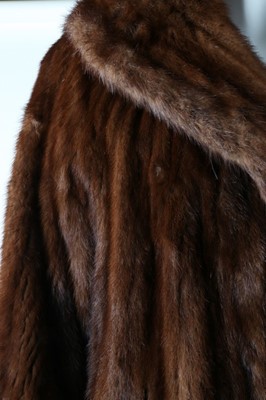 Lot 52 - Two fur coats, 1950s, one of tan fur probably...