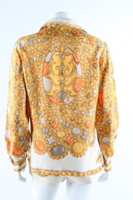 Lot 19 - A Pucci printed silk blouse and matching...