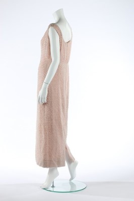 Lot 99 - A Guy Laroche couture pink beaded sheath,...