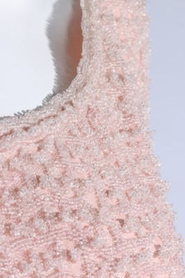 Lot 99 - A Guy Laroche couture pink beaded sheath,...