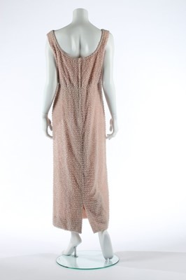 Lot 99 - A Guy Laroche couture pink beaded sheath,...