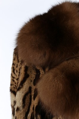 Lot 107 - An ocelot coat with sable collar, late 1960s,...