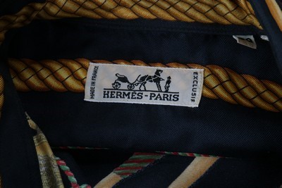Lot 45 - An Hermès 'Les Tambours' printed silk man's...