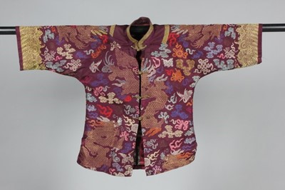 Lot 220 - A brocaded silk jacket made from a Chinese...