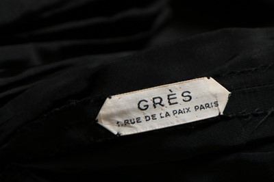 Lot 51 - A Madame Grès couture black faille evening...