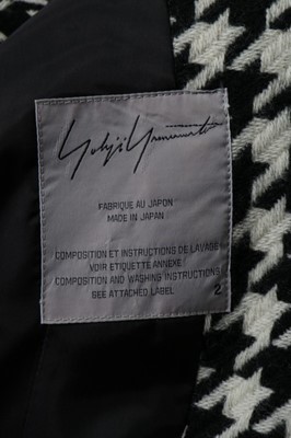 Lot 363 - A Yohji Yamamoto hound's tooth checked coat,...