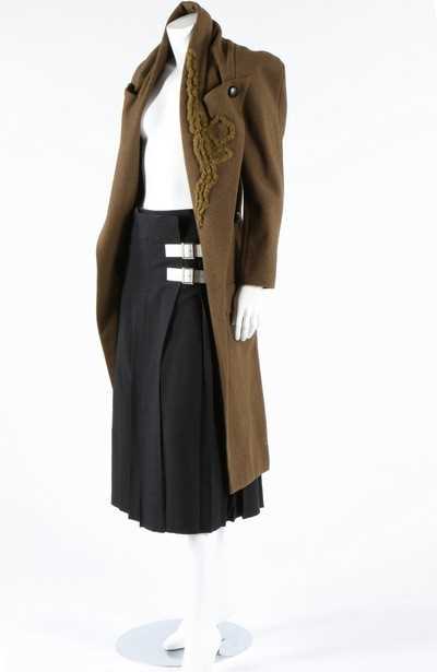 Lot 373 - A Yohji Yamamoto olive-green tweed tailcoat,...