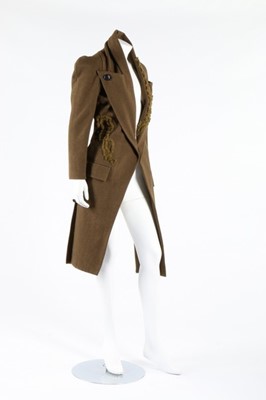 Lot 373 - A Yohji Yamamoto olive-green tweed tailcoat,...