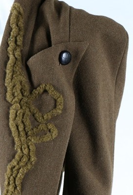 Lot 373 - A Yohji Yamamoto olive-green tweed tailcoat,...