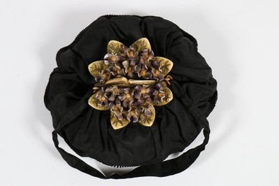 Lot 251 - Two fine moulded celluloid mounted evening...