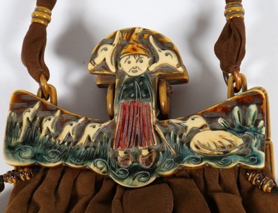 Lot 251 - Two fine moulded celluloid mounted evening...