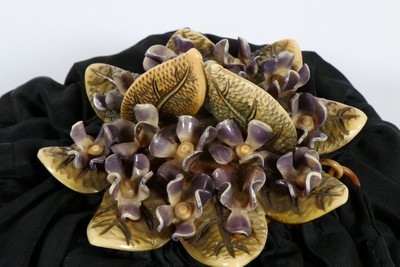 Lot 251 - Two fine moulded celluloid mounted evening...