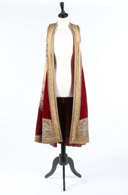 Lot 453 - An embroidered wine velvet surcoat, Ottoman...