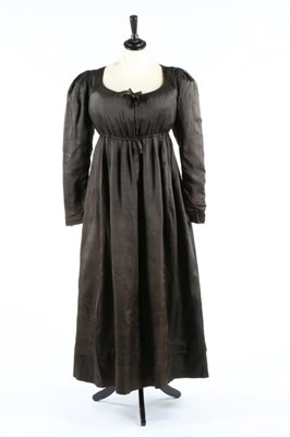 Lot 35 - A chocolate brown silk 'Quaker' dress, circa...