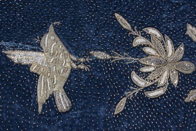 Lot 472 - An embroidered silk shawl or sari panel,...