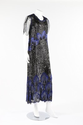 Lot 13 - A sequined tulle flapper dress, early 1920s,...
