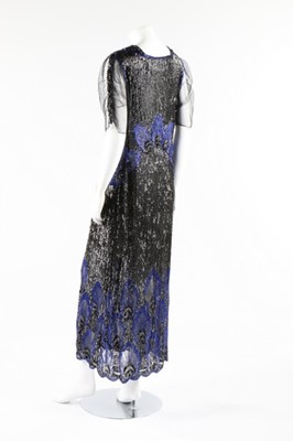 Lot 13 - A sequined tulle flapper dress, early 1920s,...