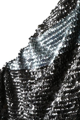 Lot 15 - A dramatic sequined bat-wing opera cape, 1920s,...
