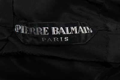 Lot 1 - A Pierre Balmain couture black silk crepe...