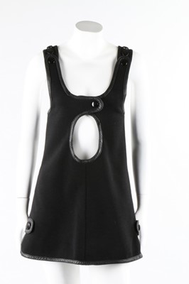 Lot 9 - A Courreges black wool mini-dress or tunic top,...