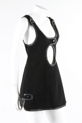 Lot 9 - A Courreges black wool mini-dress or tunic top,...
