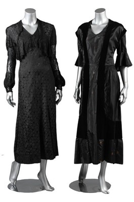 Lot 40 - Four black evening gowns, 1930s, of brocaded...