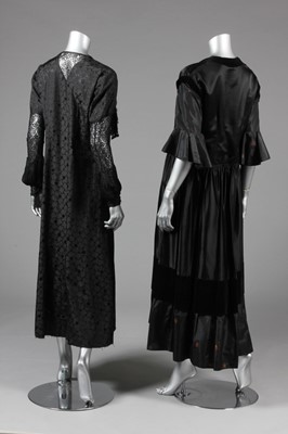 Lot 30 - Four black evening gowns, 1930s, of brocaded...