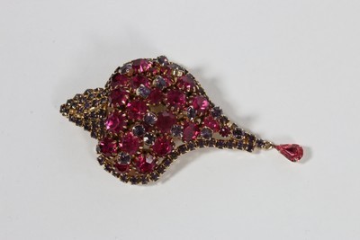 Lot 54 - A Schiaparelli pink conch-shell shaped brooch,...