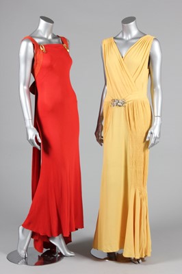 Lot 61 - Two silk crepe bias cut evening gowns, 1930s,...
