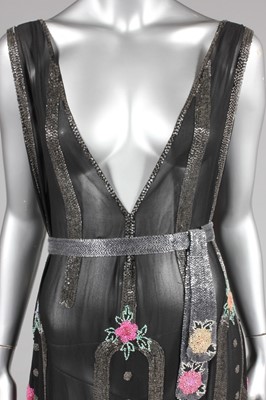 Lot 66 - A beaded flapper dress, mid 1920s, of black...