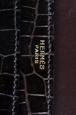 Lot 73 - An Hermès brown crocodile handbag, circa 1970,...