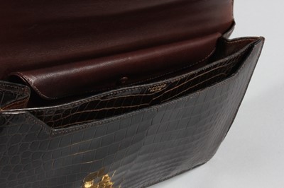 Lot 73 - An Hermès brown crocodile handbag, circa 1970,...