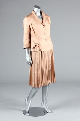 Lot 81 - A Maggy Rouff couture old-rose shantung silk...