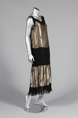 Lot 82 - A gold lamé cocktail dress, late 1920s-early...