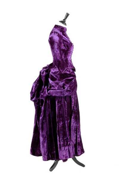 Lot 28 - A fine velvet plush mourning gown, circa 1887,...