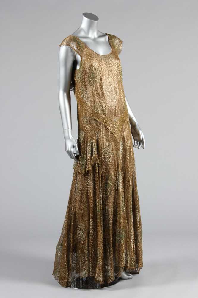 Lot 91 - A Madame Wyatt beaded gold lace evening gown,