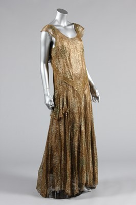 Lot 91 - A Madame Wyatt beaded gold lace evening gown,...